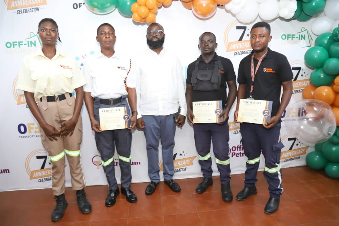 Offin Security awardees holding certificates with leadership at the 7th anniversary celebration